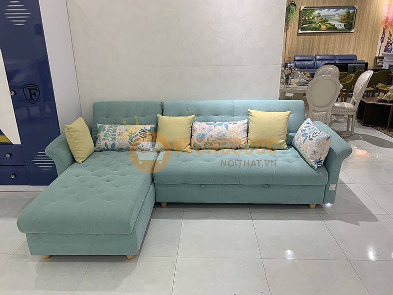 Kê sofa sát tường hoặc ở chân cầu thang đều hợp lý 